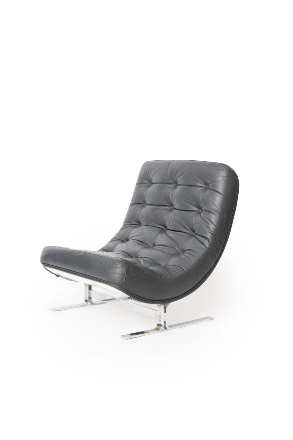 Modernist lounge chair in grey leather